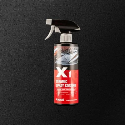 One Kapak X1 ceramic spray coating bottles on dark background