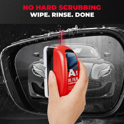 Hand using Kapak oil film cleaning brush on wet windshield removing grime with no scrubbing needed